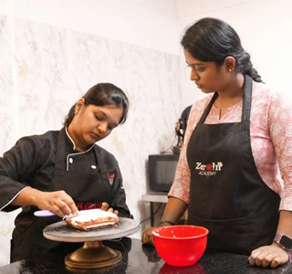 Student baking cake in Zeroin Academy class